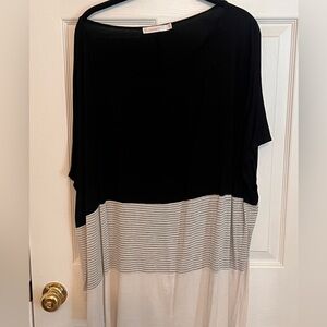 Oversized off the shoulder top with slanted hemline on notion - adorable on